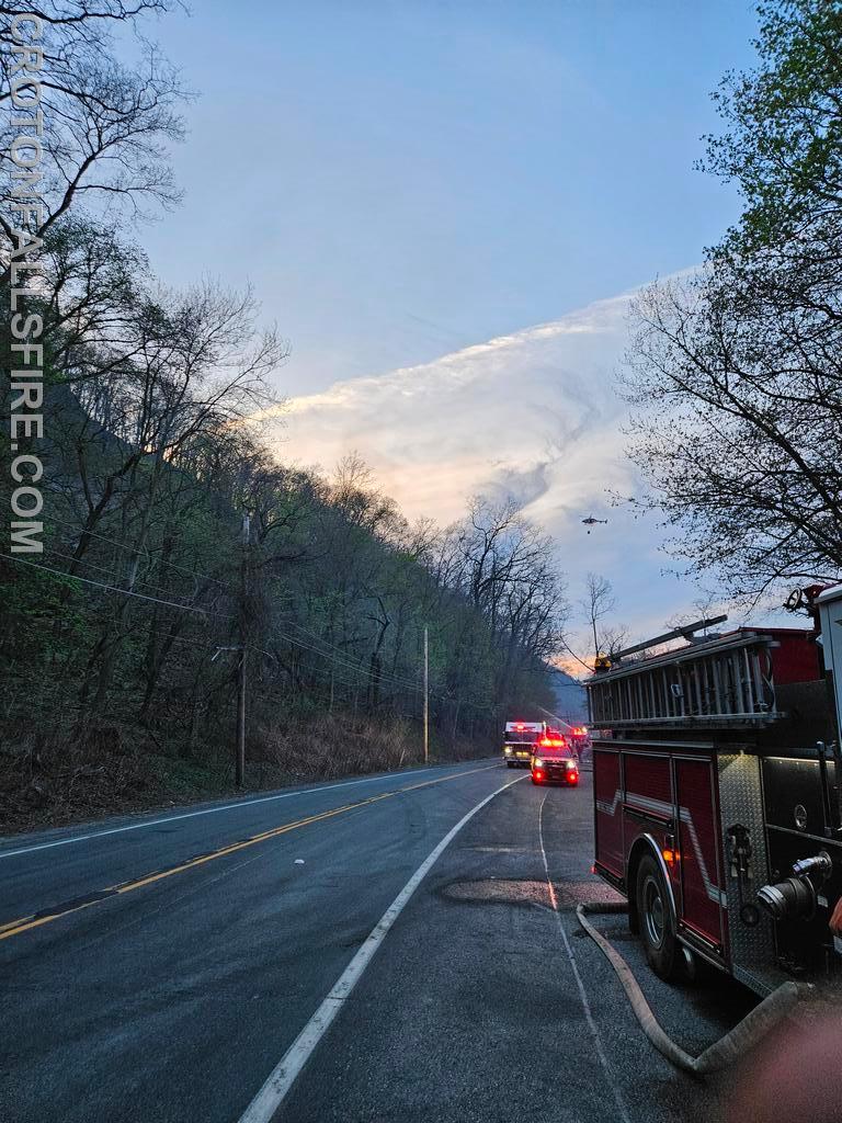 Westchester County Police Aviation with a bambi-bucket drop in West Haverstraw, 04/14/23