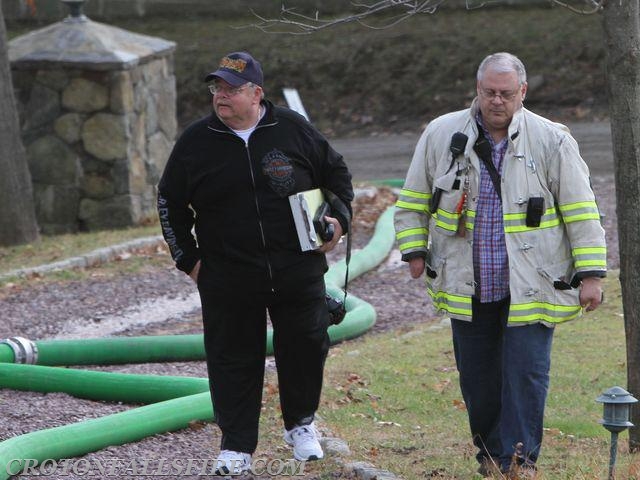 Fire investigators at a residential structure fire on Baxter Road, 11/26/15