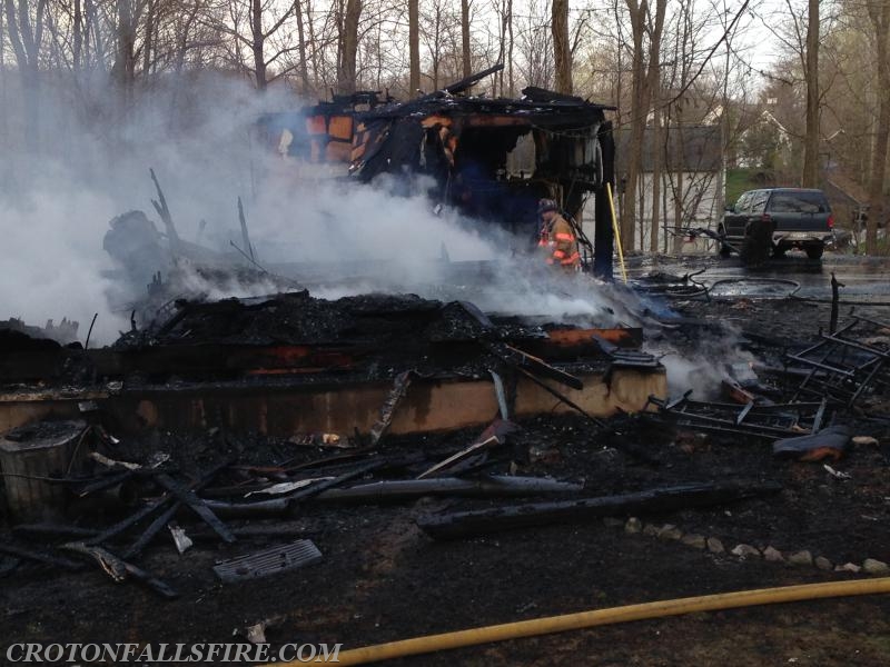 Mutual aid response to Mega Road in Mahopac for a structure fire with a brush fire, 04/18/16