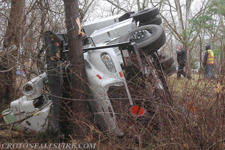 Rollover of a bucket truck for tree work on Mills Road, 12/12/16