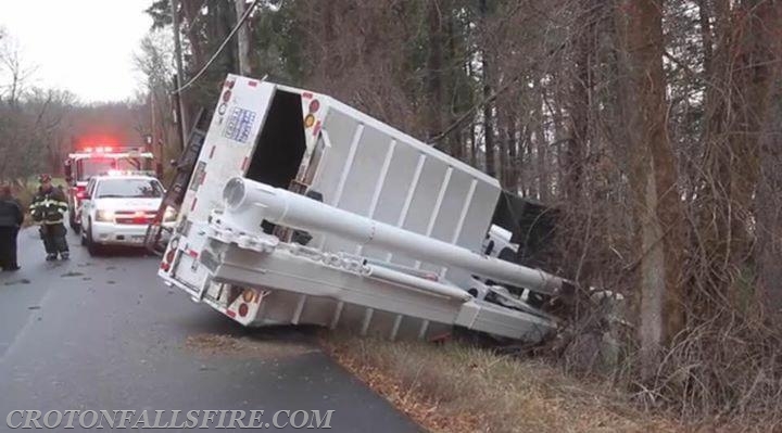 Rollover of a bucket truck for tree work on Mills Road, 12/12/16