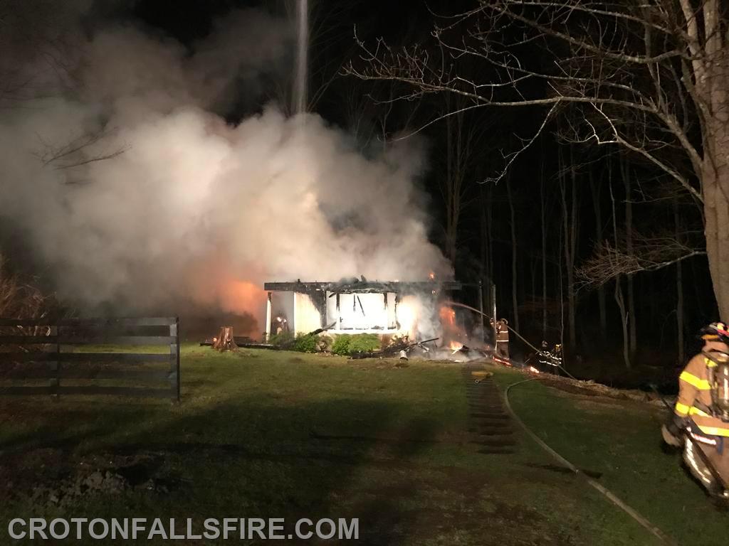 Remains of a cottage at a mutual aid structure fire in Brewster, 04/04/17